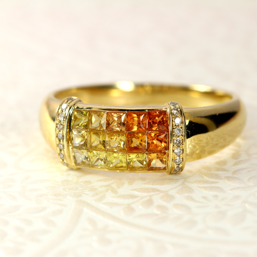 イエロー・オレンジサファイア0.6ct ダイヤモンド ミステリー イエロー